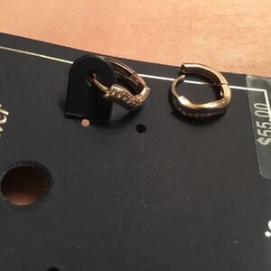 NWT. 12mm Wavy Huggie Earrings with CZ’s